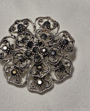 Brooch Vintage Layered Silver Toned Metal Flower With Irridescent Stones.